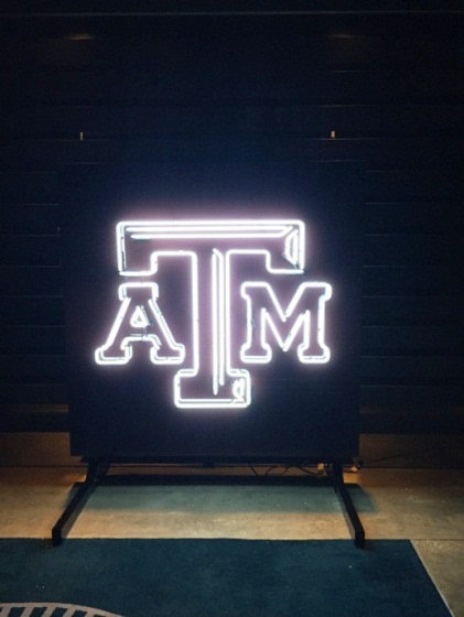 Texas A&M University uses a bright neon light to advertise their logo
