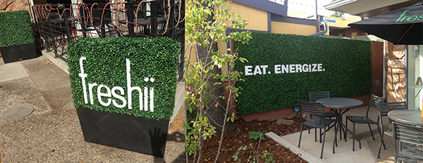 The restaurant Freshii uses faux foliage around their restaurant