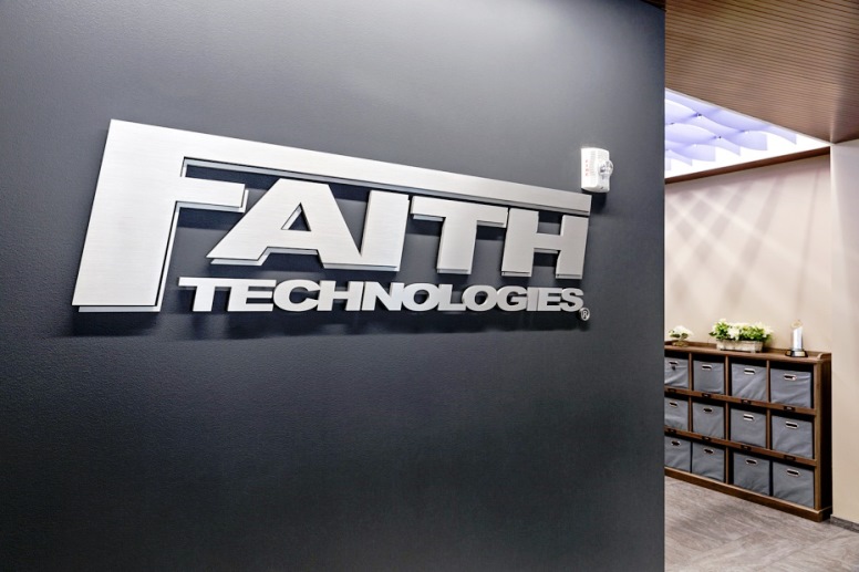 Faith Technologies uses wall lettering on their company walls