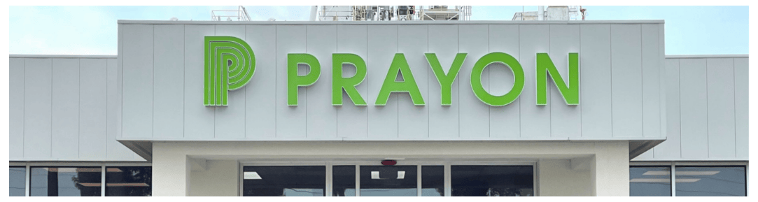 Green lettering on a white roof
