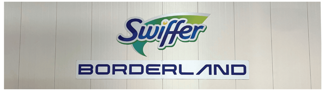 silver wall with Swiffer logo