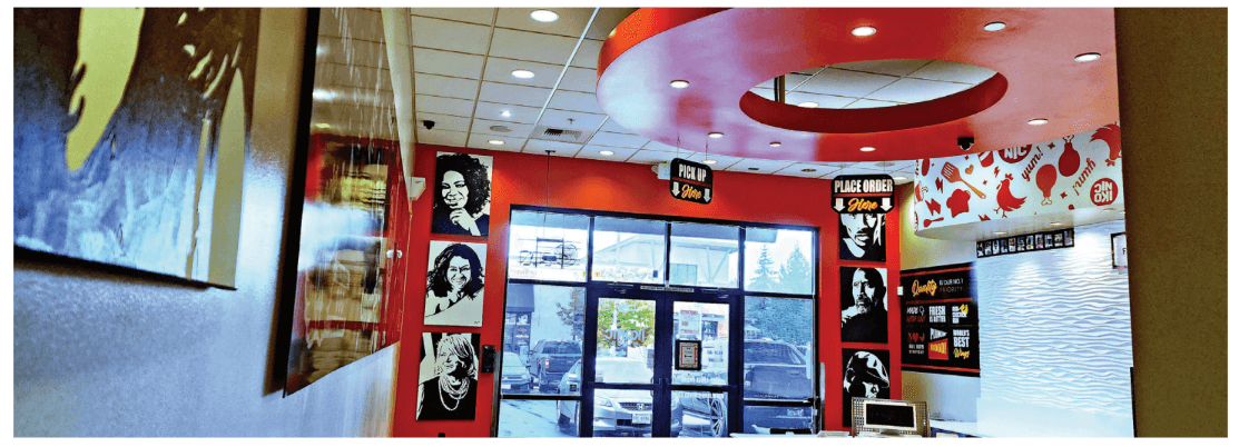 red walls with portraits