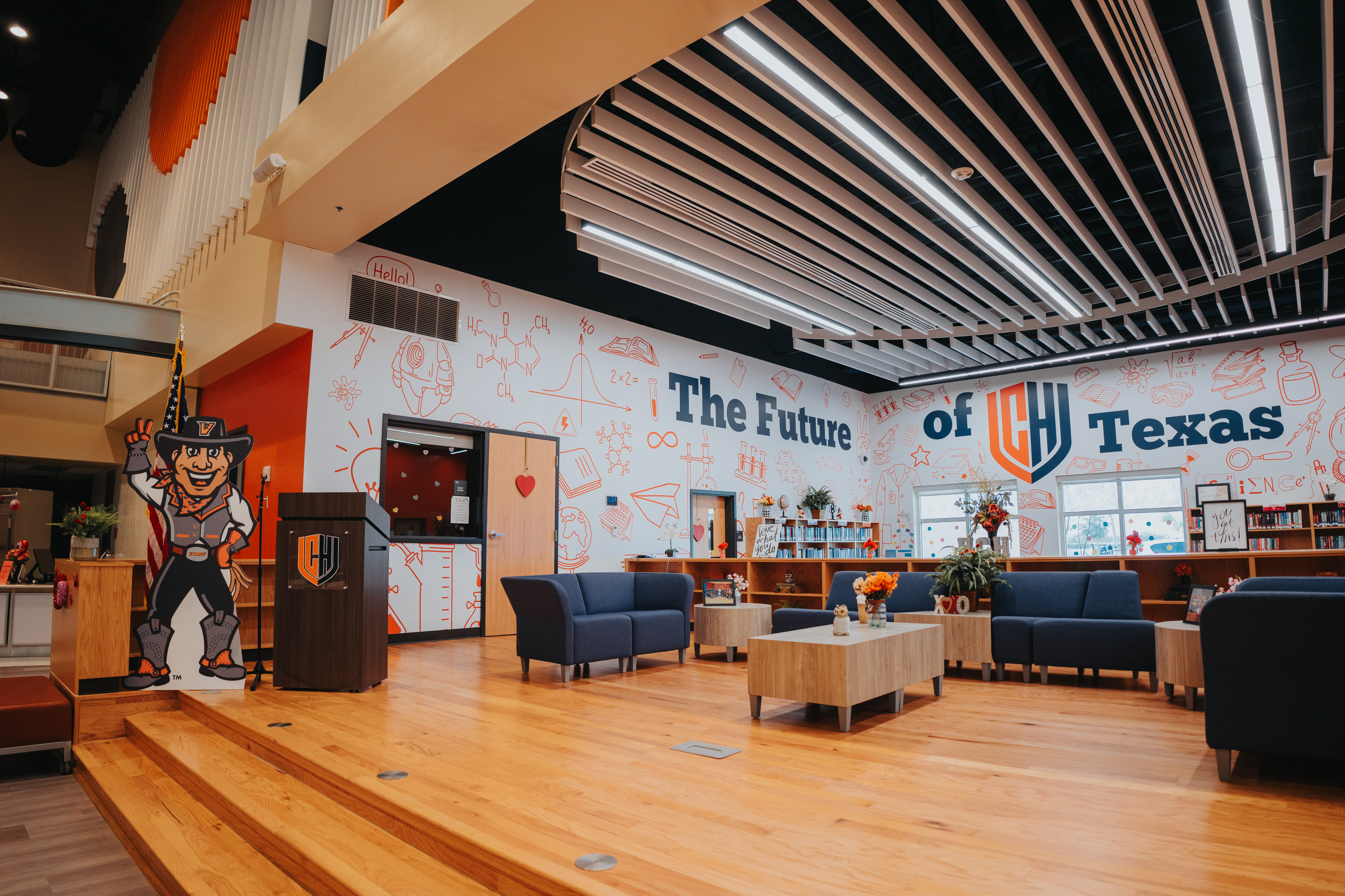 school campus with couches and tables in a common area