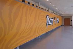 Towson university yellow wall mural with graphics