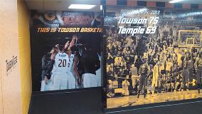 Towson university wall mural of basketball players