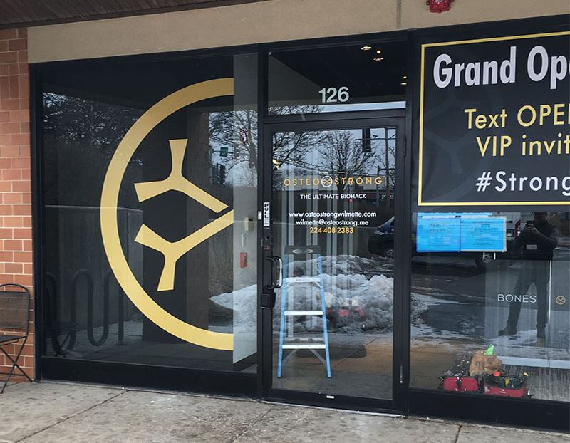 Osteo Strong sign on the door with window graphics