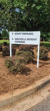 Directory signage on the side on the side of the road 