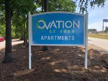 Ovation at 3500 apartments signage on the side of the road