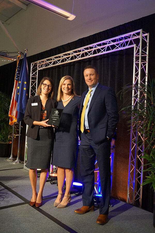 Mike and Maranda Richardson receiving an award