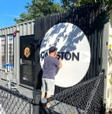 Cawston dimensional letters sign installed by a man