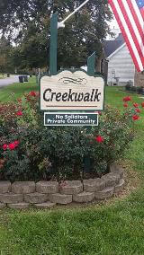 Creek walk exterior signage on the garden