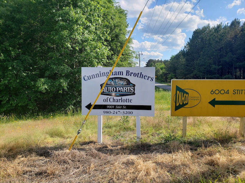 Cunning human wayfinding sign on  alot