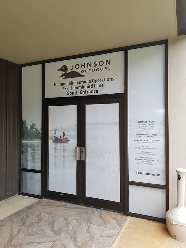 Johnson Outdoors Custom banner on the entrance door of the office