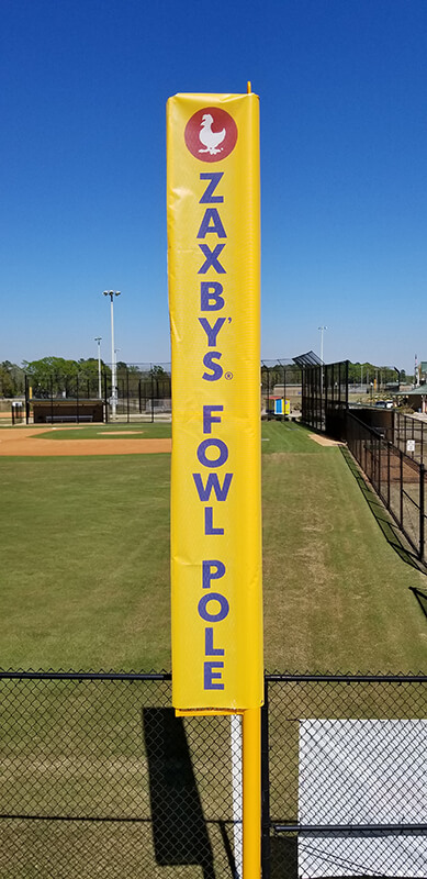 Yellow Pole wrap with letters on the side of the field