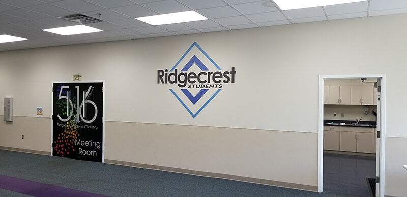 Ridgecrest students logo on the wall of an establishment