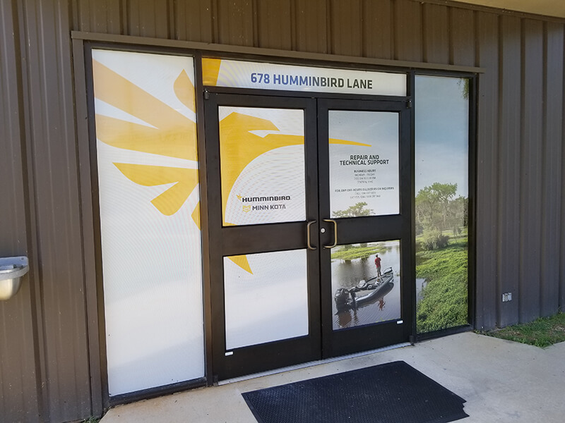 Custom banner on the front door of an establishment