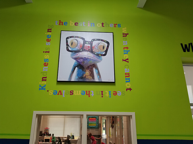 Colorful frog image on the wall