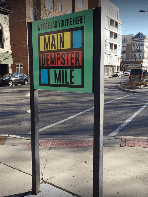 Green exterior signage of mile dempster mile on the street