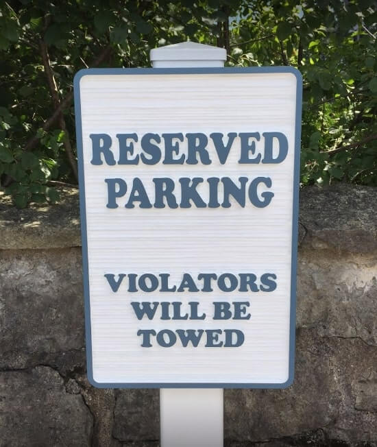 Reserved parking signage on the wall frame