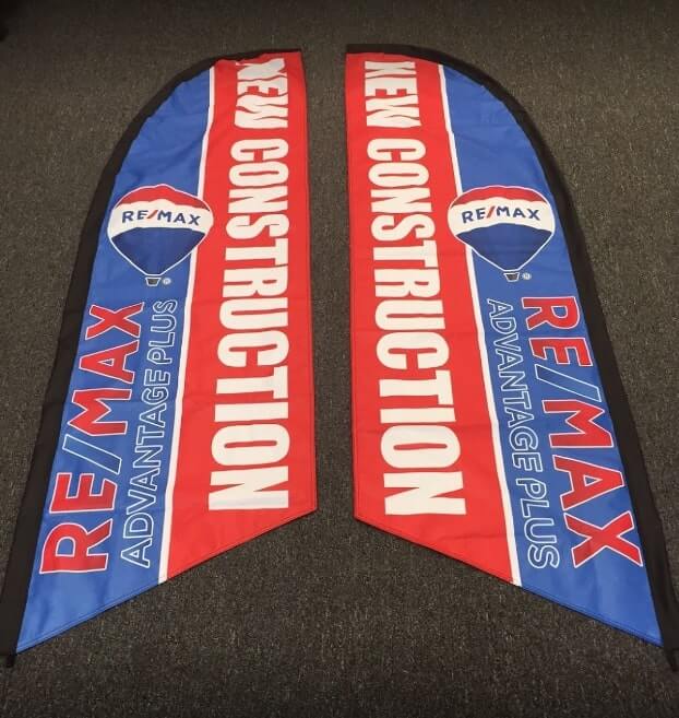 blue and red remax feather flag
