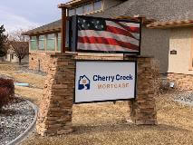 Cherry creek mortgage sign monument outside the building