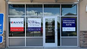 Glass door with posters and banners