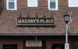 Kenny's place sign on the building