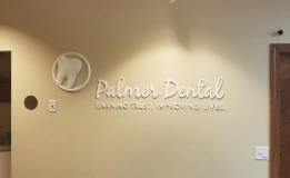 Palmer dental dimensional sign on the wall