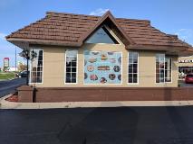 Rool and donuts graphics on the window