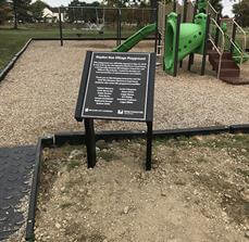 Mayden Village run playground monument sign on the playground