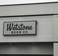 Wetstone Beer custom sign on the building