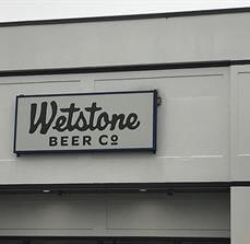 Wetstone Beer custom sign on the building