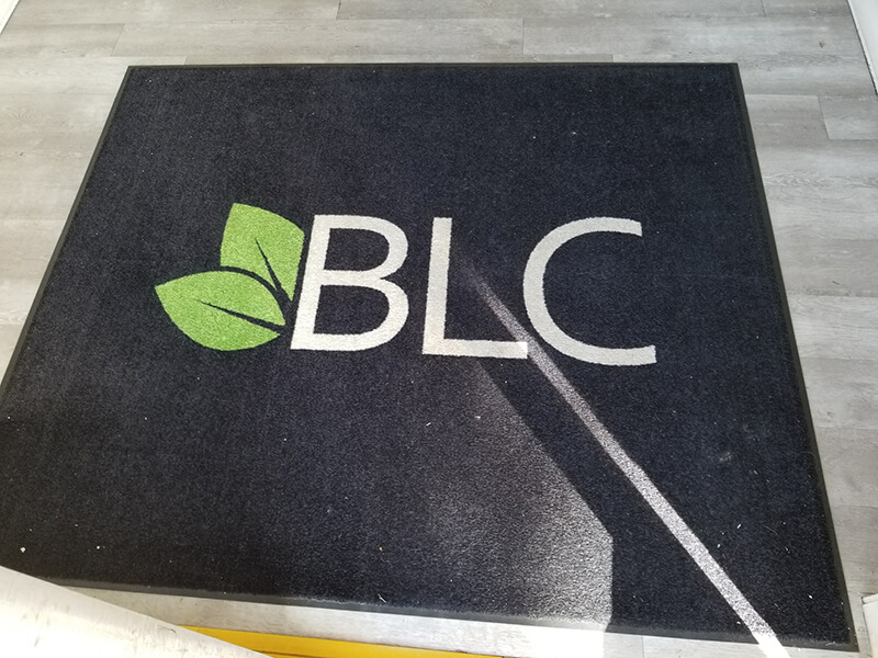 Green and whote lettering in the black decal