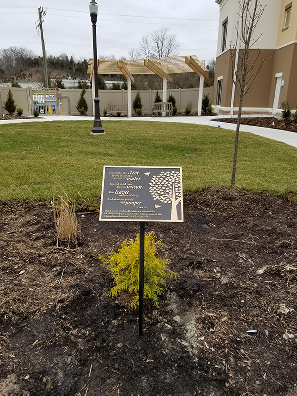 Black and gold exterior signage