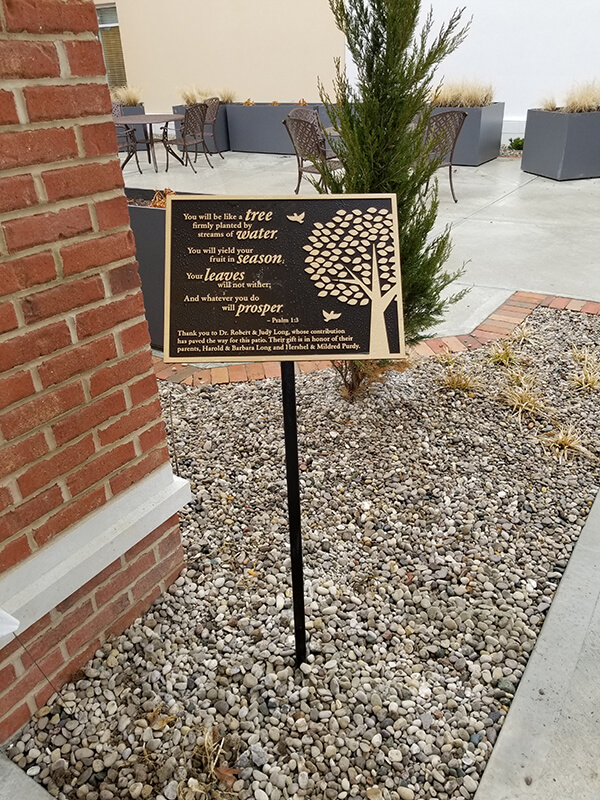 Black and gold theme exterior signage