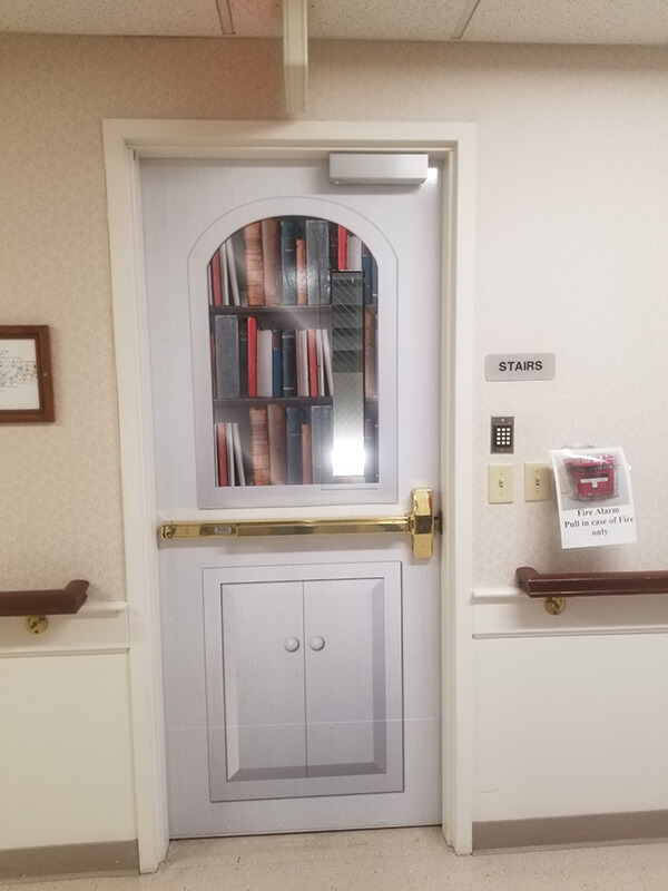 Door window with book graphics