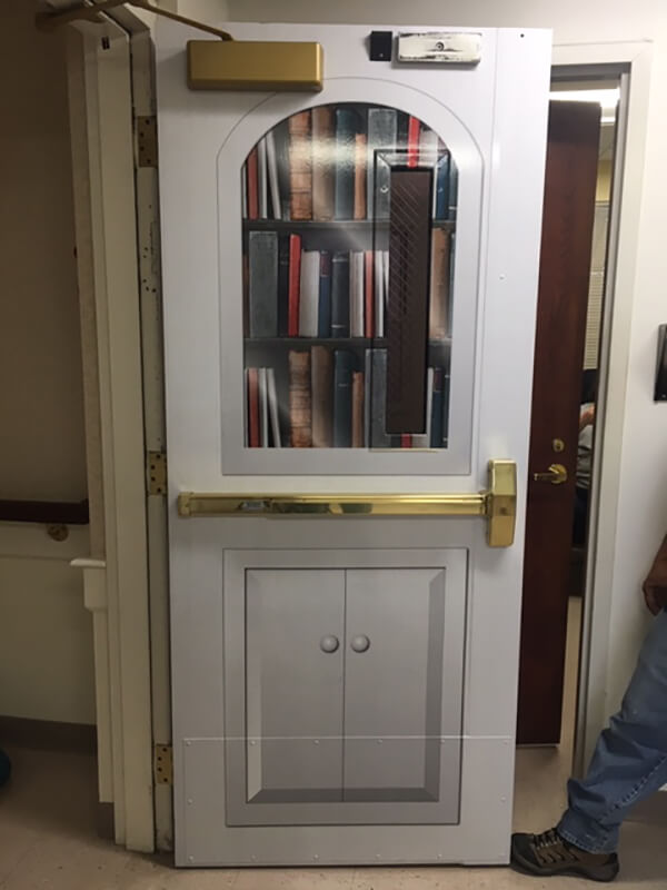 Door window with book graphics
