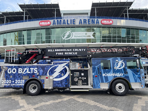 a fire truck is wrapped in bolts themed wrap