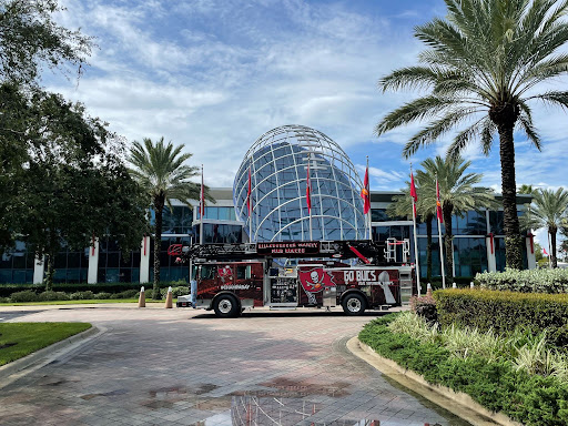 a fire truck is wrapped in graphics for Florida sports teams