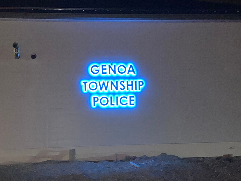 Blue Luminis signage of genoa township police