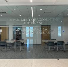 Department of accounting and finance decal on the glass window of the building