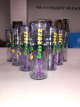 Promotional tumbler of Mardi grass on the table