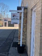 Ortho advantage entrance signage in the post outside the store
