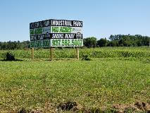 Wayfinding sign in the middle of the field