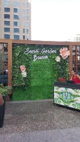 Signage on grass backdrop during event