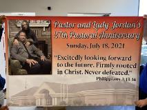 Pastor and lady Jordan with image Custom banner