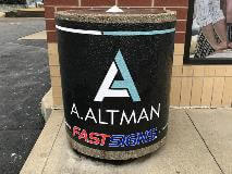 A.Altman statue sign outside