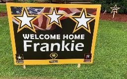 Welcome home frankie custom sign on the grass