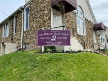 Purple signage outside