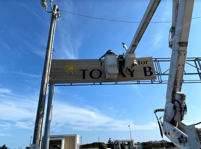 Fixing Toby Beach banner sign